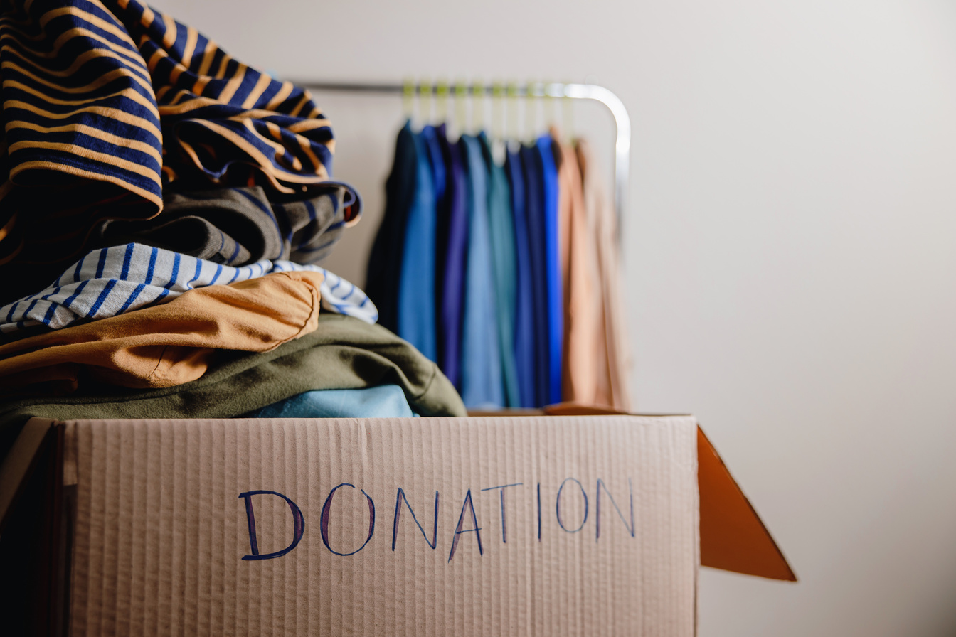 Old Clothes in a Donation Box 